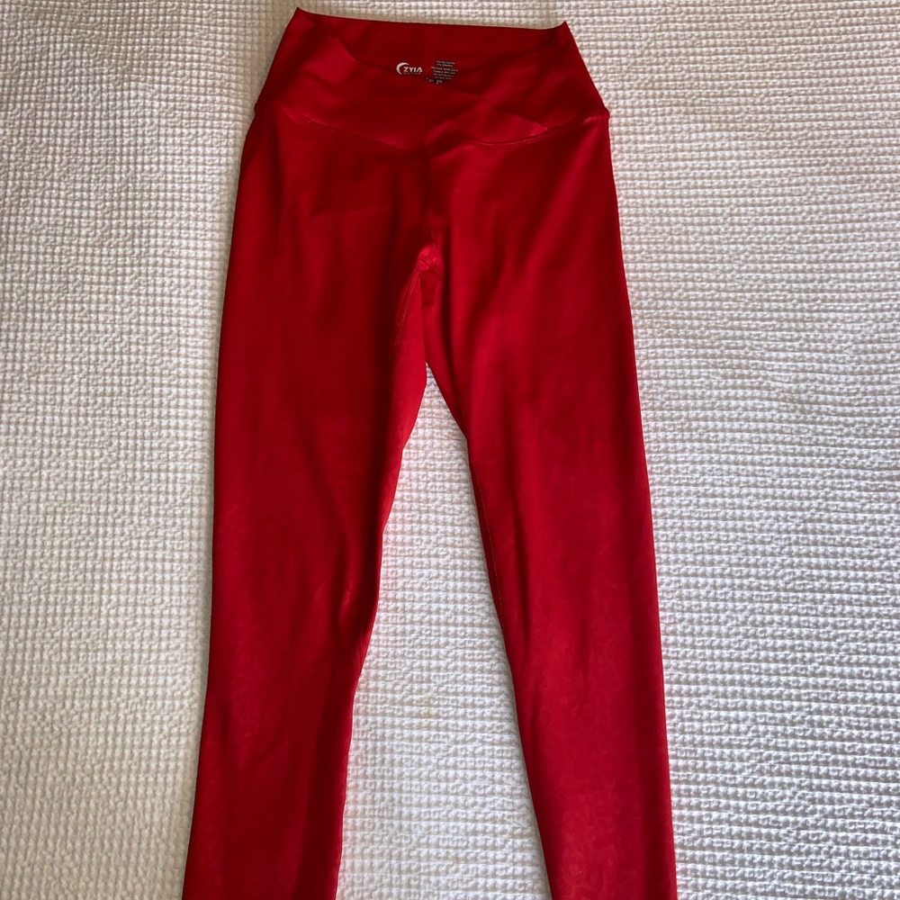 Red Leggings with cheetah print background